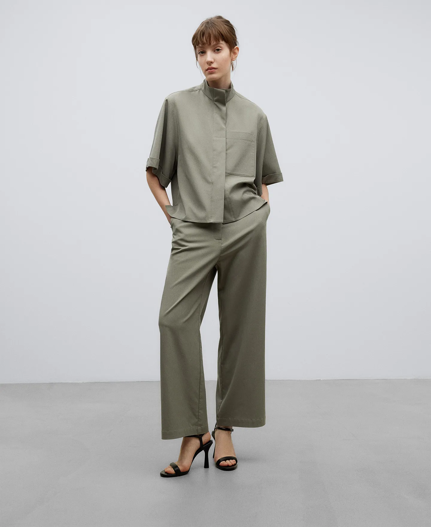 Grey high collar shirt woman