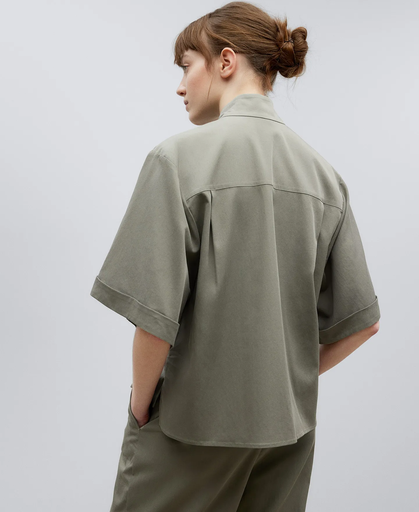 Grey high collar shirt woman