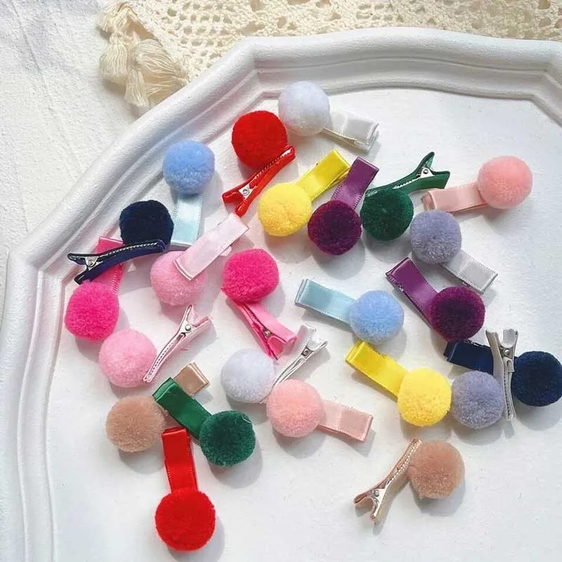 Pinza de pelo niña con pompon