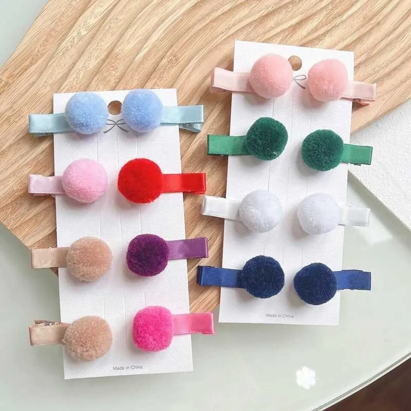 Pinza de pelo niña con pompon